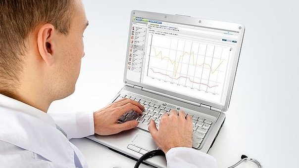 Physician operating Fresenius Medical Care's Therapy Support Suite (TSS)